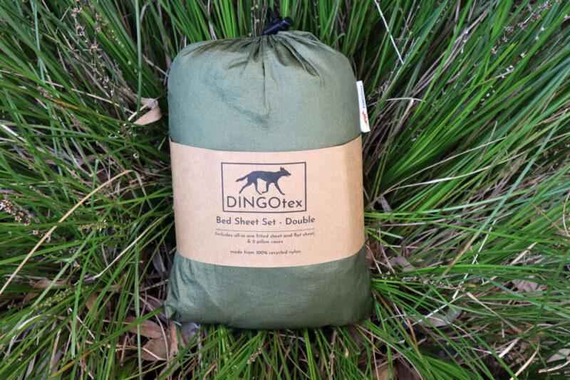 eco-friendly travel sheet on green grass