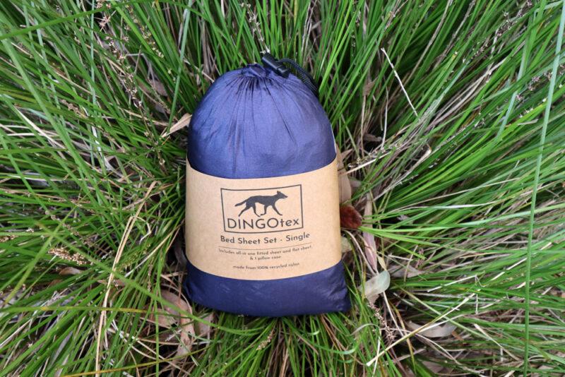eco-friendly travel sheet blue on grass